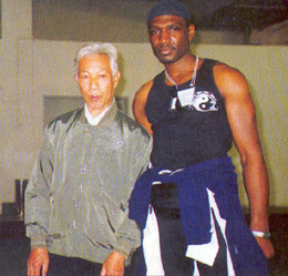 Garry McKenzie with Top Wing Chun master Leun Gai in Faat Saan. Victor J.T Appiah interviews Sifu Garry McKenzie