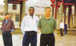 Grandmaster Ip Ching and Garry in Faat	Saan, outside the ancestral hall.