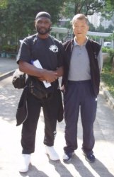 Grand Master Ip Ching & Sifu Garry McKenzie walking in Hong Kong